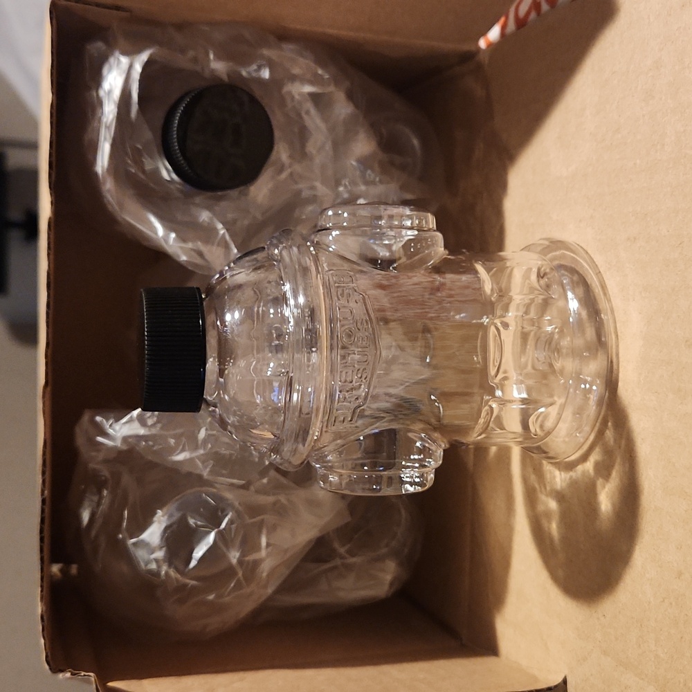 10 ounce Fire hydrant dressing containers with lids.